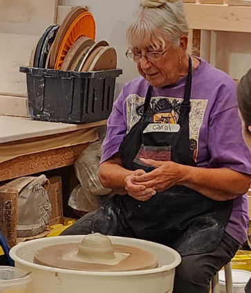 Master potter Carol Hutchinson of SweetMud Studios teaching at earth studios
